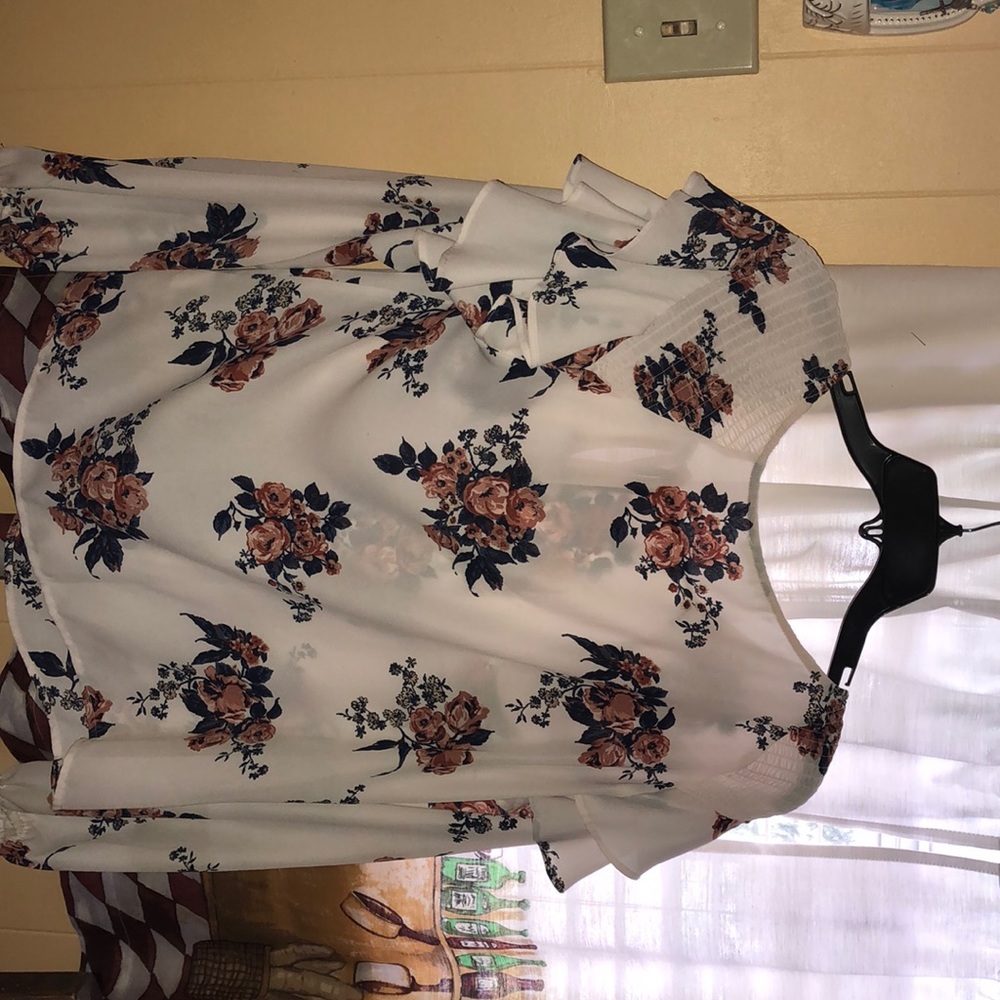 white flowered blouse